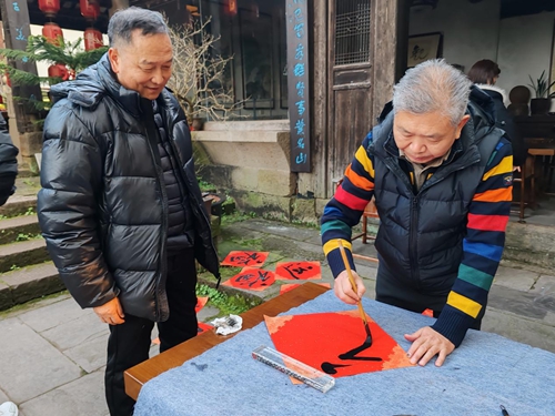 广安市义务工作者联合会开展“新春送对联”公益活动